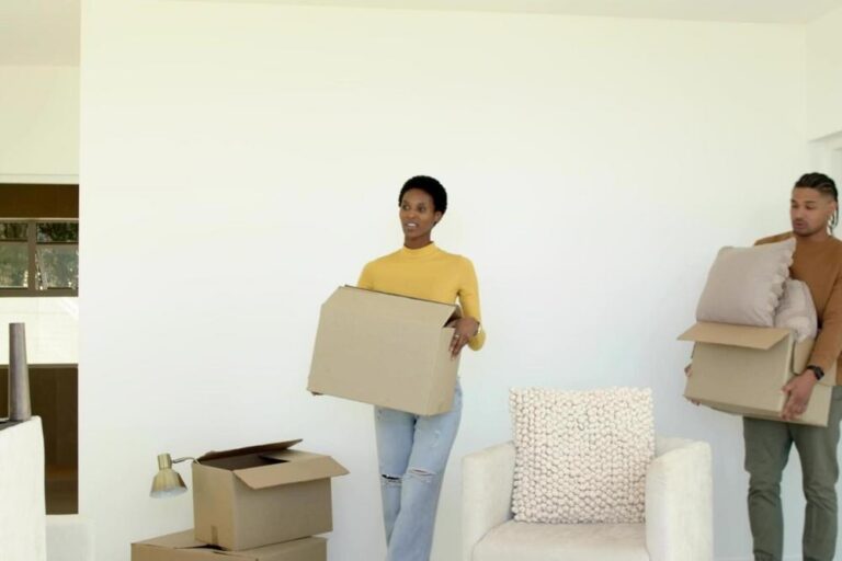 A couple moving into a home.